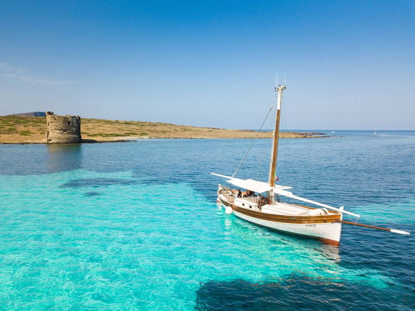 From Stintino: Asinara Vintage Sailing Boat Tour with Lunch - Cala Barche Napoletane: swim time, then lunch with drinks