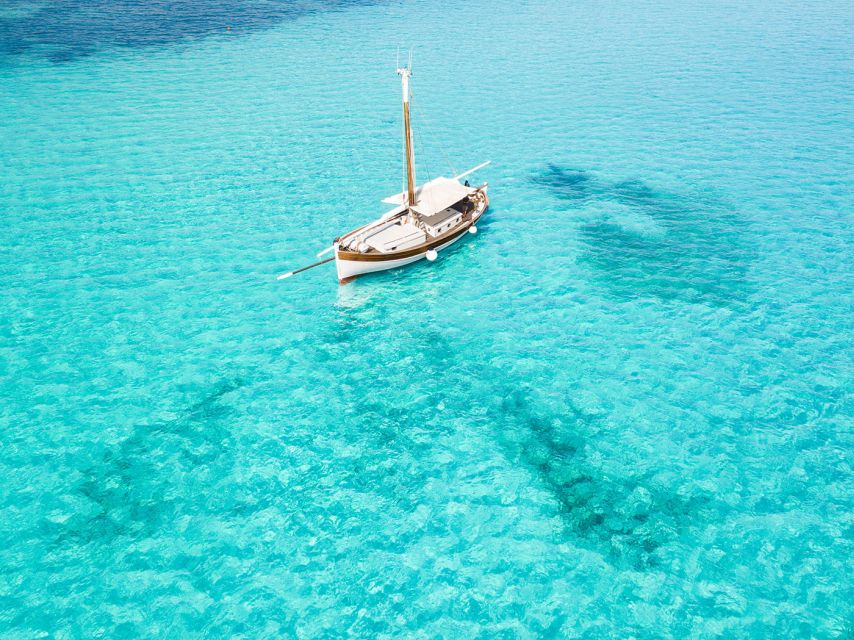 From Stintino: Asinara Vintage Sailing Boat Tour with Lunch - Cala del Bianco: the emerald-green finish you’ll remember