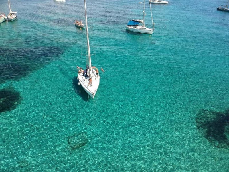 From Stintino: Half-Day Sailing Boat Tour to La Pelosa - Finding Diavola near the fuel station and getting your bearings fast