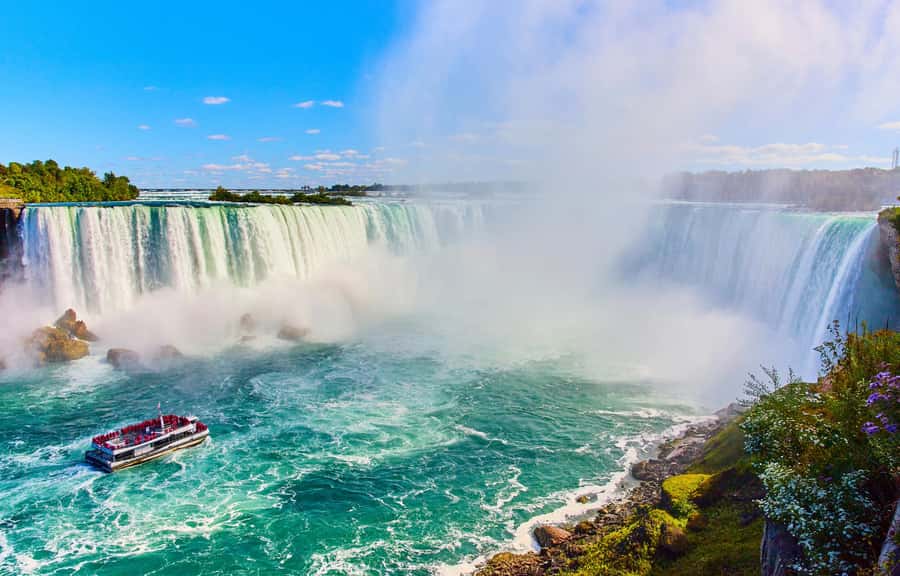 From Toronto: Niagara Falls Tour + Boat Ride and/or Journey - Niagara River photo stops: Whirlpool, Floral Clock, and more