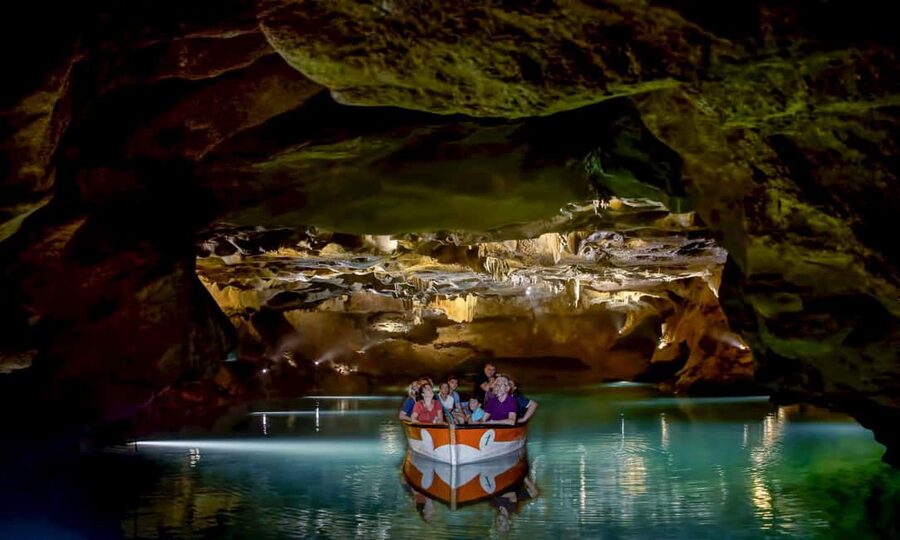 From Valencia: Caves of San José Guided Tour & Boat Ride - Caves of San José: 20°C underground comfort from the first bus stop