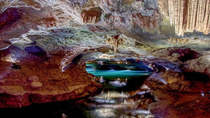 From Valencia: Caves of San José Guided Tour & Boat Ride - Free time near the caves: coffee, archaeology, and buying a real souvenir