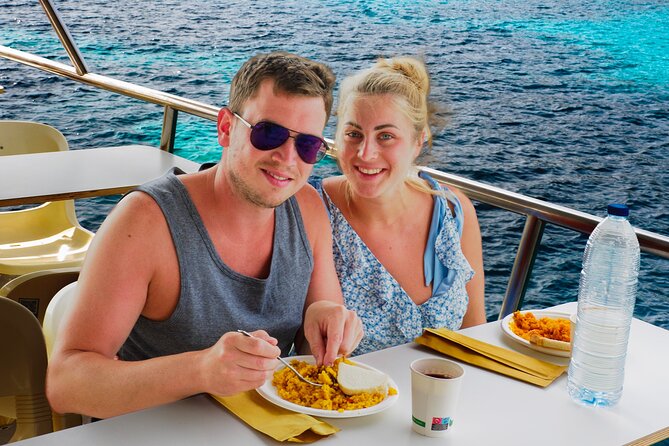 Full day boat tour transfers & lunch included - Cala en Turqueta: swim time plus the on-board lunch plan