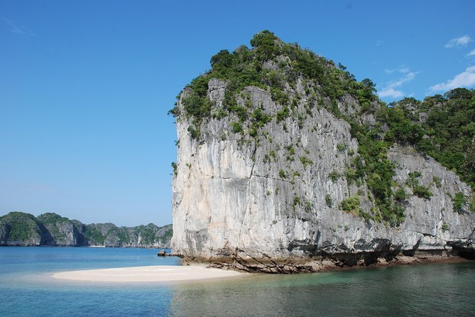 Full day boat trip with Cat Ba Captain Jack to Lan Ha Bay and Ha Long Bay - Three-Peach Beach Swim Stops: White Sand, Clear Water (When Conditions Behave)