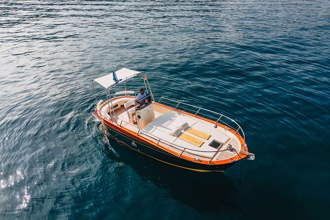 Full-Day Private Capri Boat Tour - Capri by sea: swim breaks and the Faraglioni finale