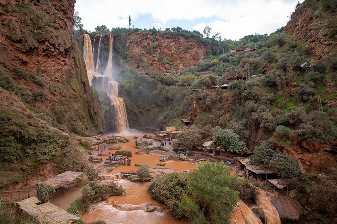 Full Day Trip To Ouzoud Waterfalls From Marrakech & Boat Tour - The hand-powered boat ride: up close with the falls