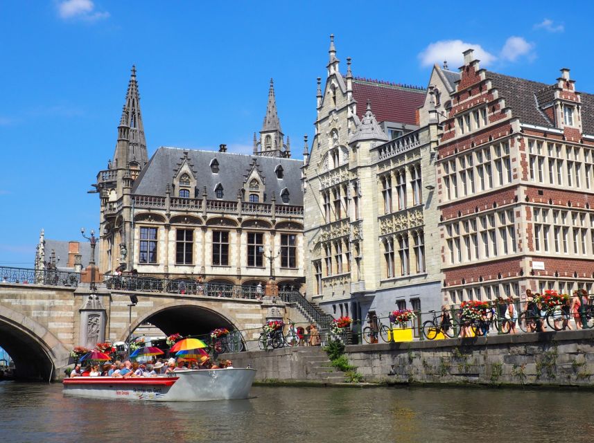 Ghent: 40 Minute Medieval Center Guided Boat Tour - Boarding and the First Glide Through Ghent’s Medieval Harbor