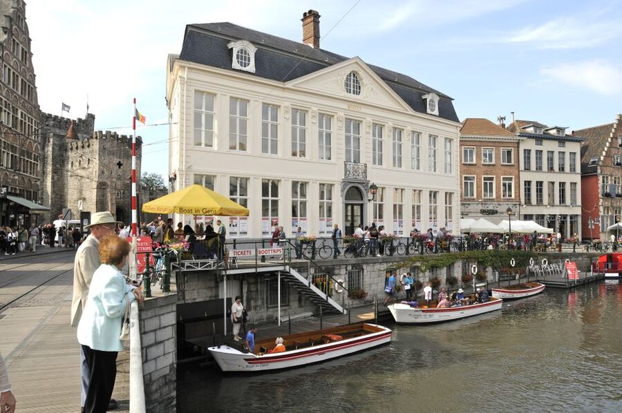 Ghent: 50-Minute Medieval Center Guided Boat Trip - Guildhalls and market streets: seeing the economy from quay walls