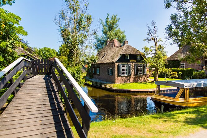 Giethoorn and Afsluitdijk Day Trip from Amsterdam with Boat Trip - The One-Hour Boat Trip: Your Best Shot at the Real Giethoorn