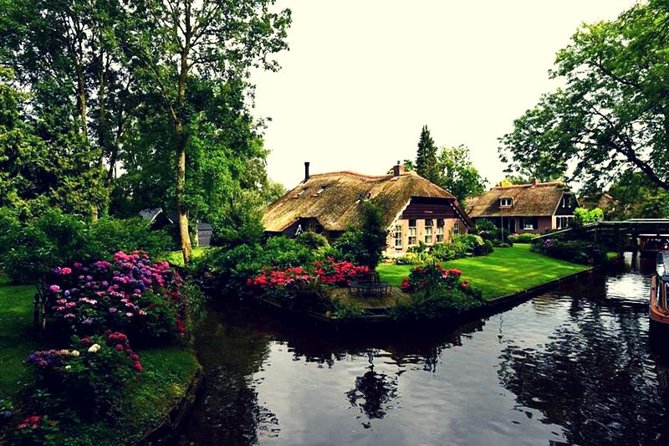 Giethoorn Day Tour from Amsterdam with Small Boat Ride - Key highlights worth your time