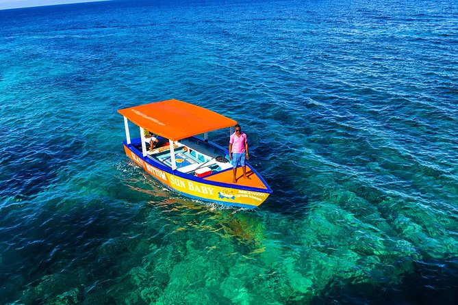 Glass Bottom Boat Ride/Snorkeling/Booby Cay Island from Negril - Booby Cay Island: beach time, swimming, and the local grill