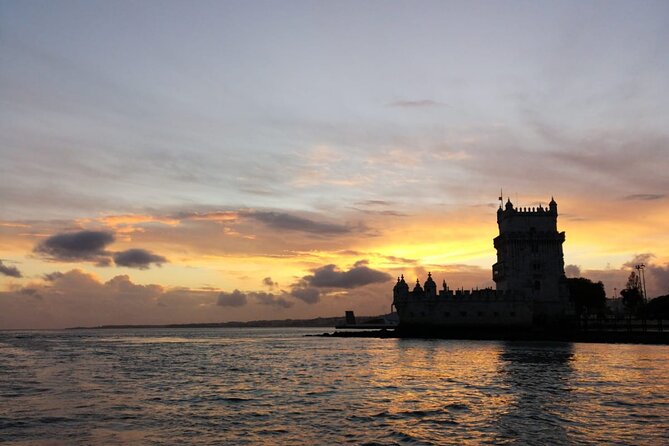 Golden Hour Boat Tour - Sailing by the Monuments with Wine - Commerce Square and Rua Augusta: where the city meets the river