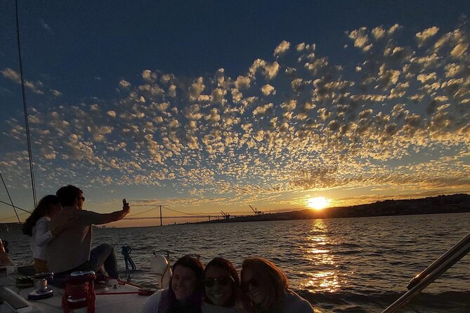 Golden Hour Boat Tour - Sailing by the Monuments with Wine - Alfama and Sé: steep streets, old walls, and church geometry