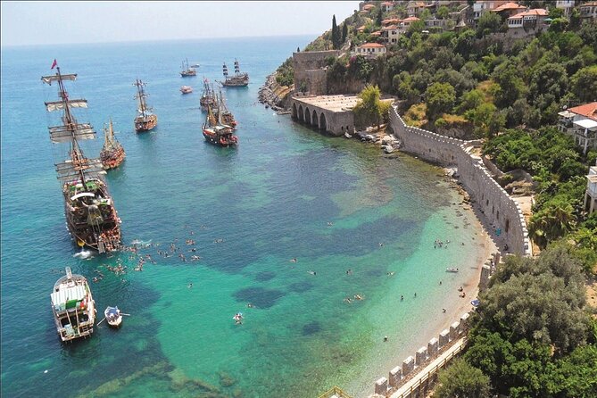 Halal Concept Short Pirate Boat Tour in Alanya - Reach Beach architecture and Kızıl Kule views