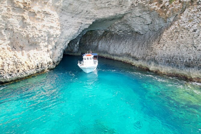 Half Day Blue Lagoon, Comino, Gozo and Malta Private Boat Trip - Santa Maria Caves: limestone scenery and another swim window