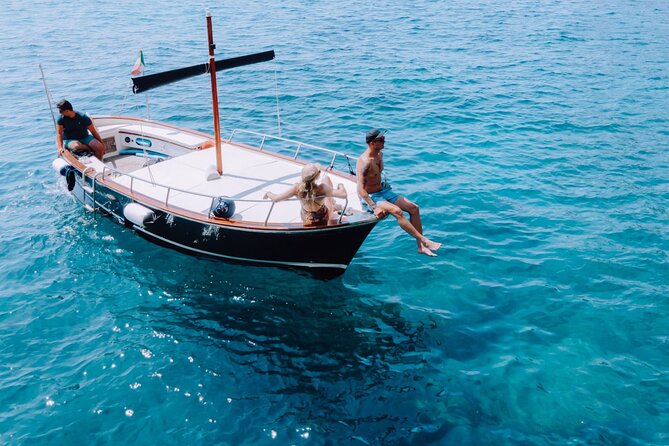 Half Day Private Boat Tour of Capri - Marina Grande and Marina Piccola: Sailors’ Cave plus a swim stop you control