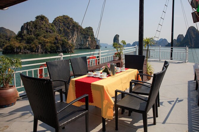 Halong 6 hours Boat tour with Cave, Kayak, lunch, transfer high-way from Hanoi - Ti Top Island: Beach Break and the 400-Step View