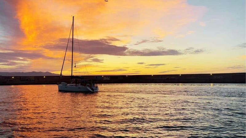 Heraklion: Dia Island Sunset Boat Tour with Dinner - Dia Island at Saint George Bay: Swimming, Snorkeling, Fishing, and SUP