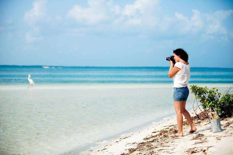 Holbox: Yum Balam Reserve Classic Boat Tour - Holbox time on the water and back on land