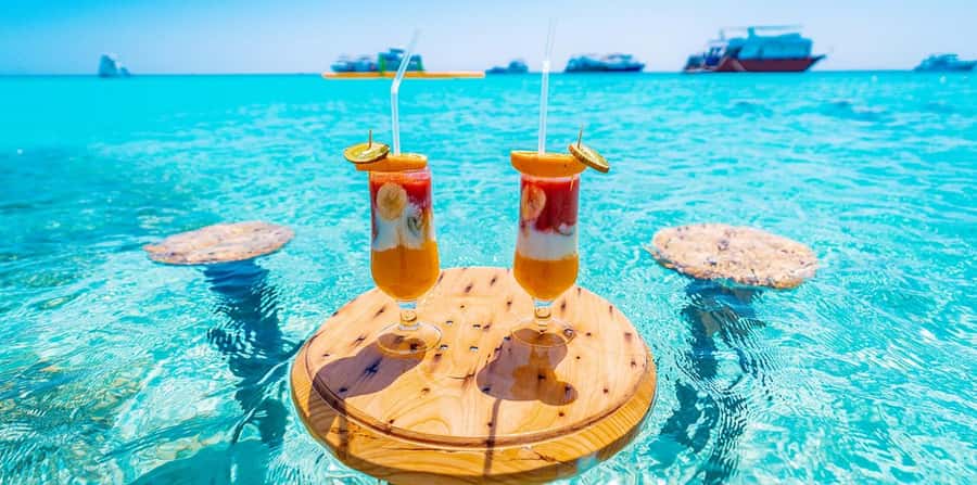 Hurghada: Hula Hula Island Boat Trip with Snorkeling & Lunch - Sunset yacht schedule: the same island, a softer light