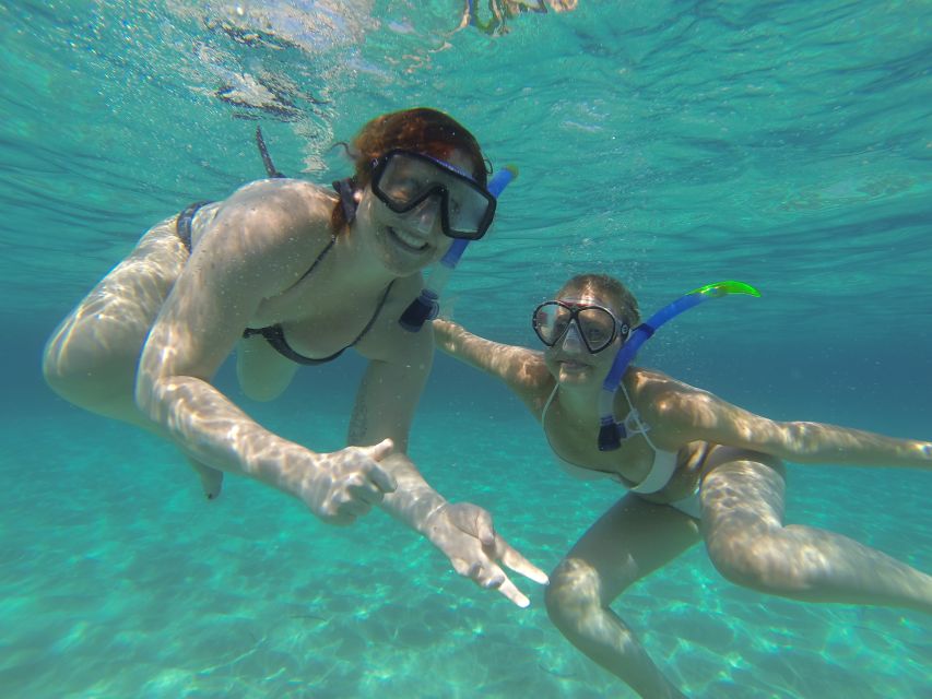 Ibiza: Snorkeling and SUP Paddle, Beach and Cave Boat Tour - Cala Conta and the sea cave gamble on Ibiza’s West Coast