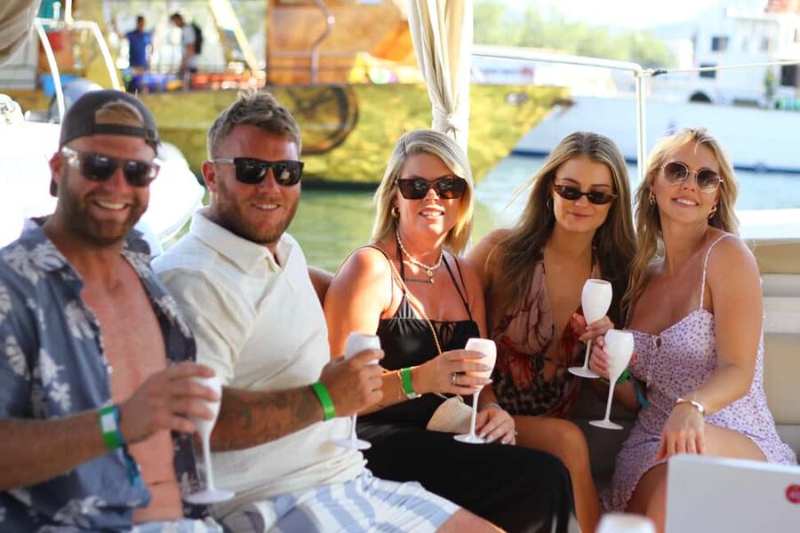Ibiza: Sunset Boat Tour with Water Sports, Open Bar & Tapas - Boarding in Sant Antoni: The Meeting Point and What to Expect