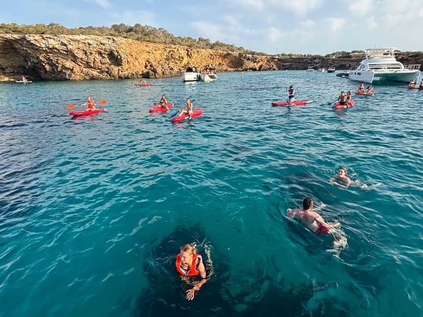 Ibiza: Sunset Boat Tour with Water Sports, Open Bar & Tapas - Sailing the Northwest Nature Reserve: Coves, Cliffs, and Cave Views
