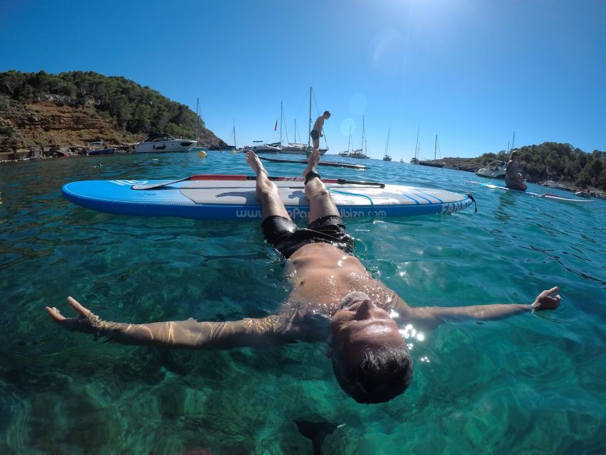 Ibiza: SUP & Snorkel Boat Tour with Caves, Drinks & Photos - Snorkeling in crystal-clear water with pro gear and a guide