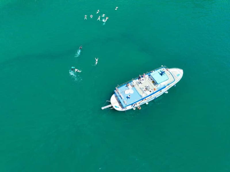 Ischia: Boat tour with swimming stops and lunch on board - Stop-by-stop Ischia: Citara, Sorgeto, Sant’Angelo, Green Grotto, and beyond
