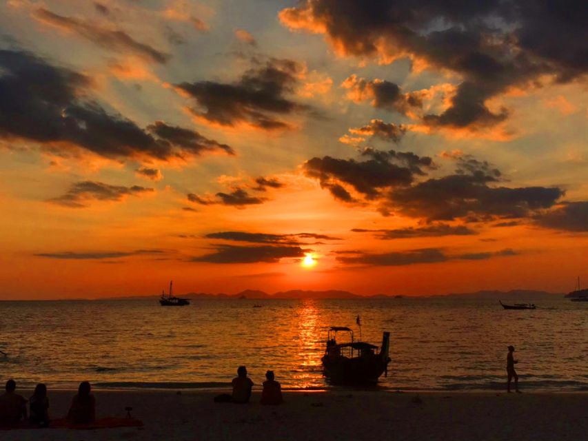 Krabi: 4 Islands Sunset Longtail Boat Tour with BBQ Dinner - Railay Peninsula and Phra Nang Beach: limestone views and an easy first swim