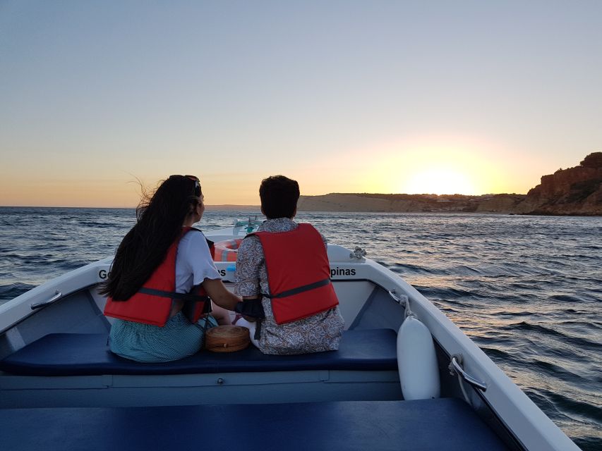 Lagos: Guided Ponta da Piedade Sunset Boat Tour - Lighthouse pass and sunset colors when the tour winds down