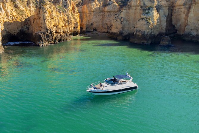 Lagos Private Boat Trip with Drinks, Snacks, Paddleboards Kayak - Praia do Vau anchor time: swimming and paddle fun in a cove