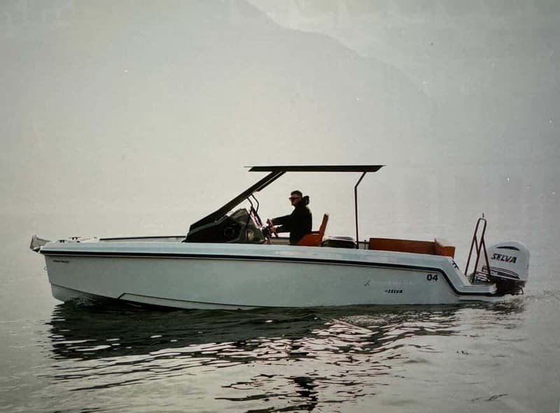 Lake Como Boat tour share- prosecco and winter cover - Protagon 25 Comfort: Drinks, Music, Bathroom, and That Swim Platform