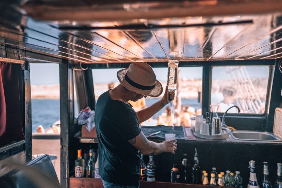 Lampedusa: Pirate Ship Boat Tour with Lunch and Music - Climbing Aboard the Galone Adriana in Lampedusa