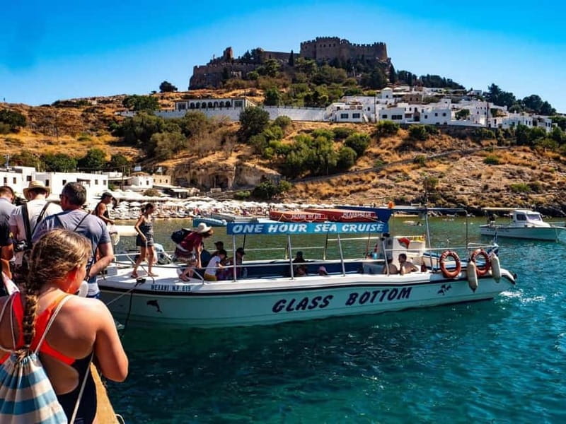Lindos: Glass Bottom Boat Tour with Snorkeling - The Lindos coast looks different from the water