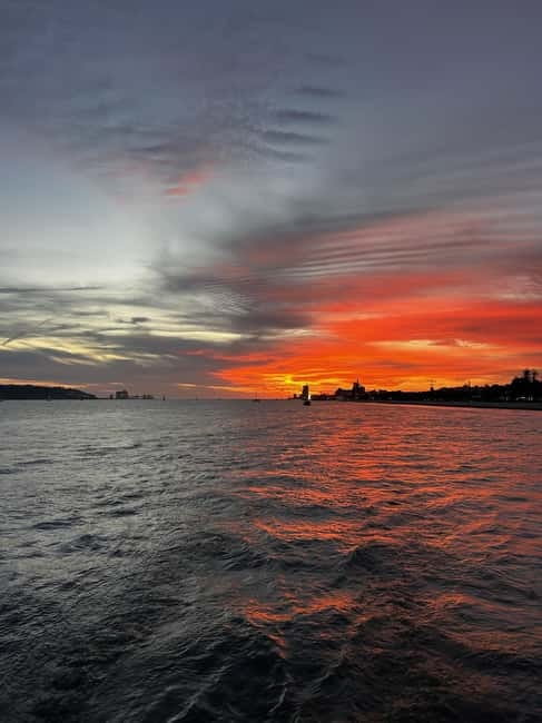 Lisbon: Sailing Boat Tour with Drinks & Pastel de Nata - The crew and the guide language: what to watch for