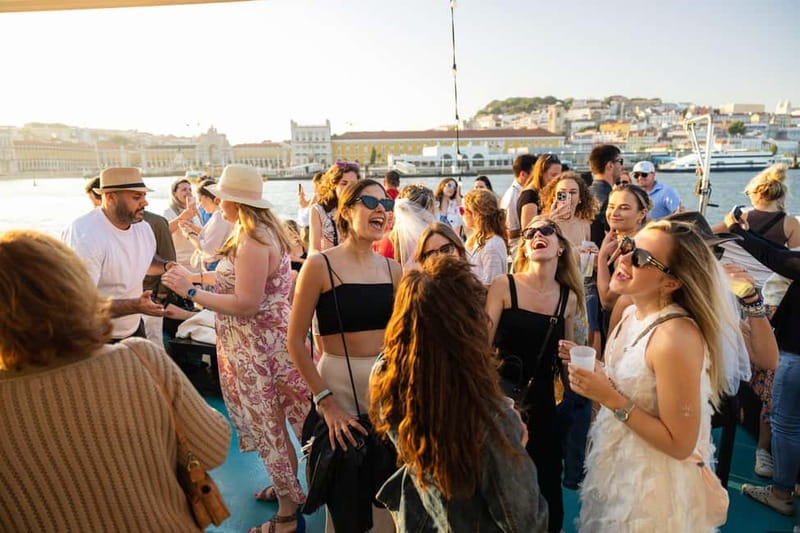 Lisbon: Sunset Boat Tour with Music and Drinks - Commerce Square and Alfama from the moving deck