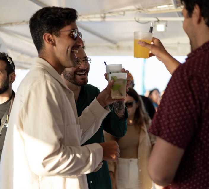Lisbon: Sunset Boat Tour with Music and Drinks - The 25 de Abril Bridge: the classic photo moment