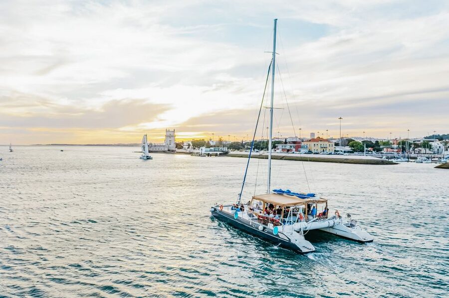 Lisbon: Sunset Catamaran Boat Tour with Music and Drinks - Price and Value at $26 for 90 Minutes on the Water