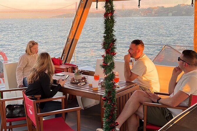 Lisbon : Sunset Catamaran Boat Tour with Music and Drinks - Price and value: is $27.44 worth it?