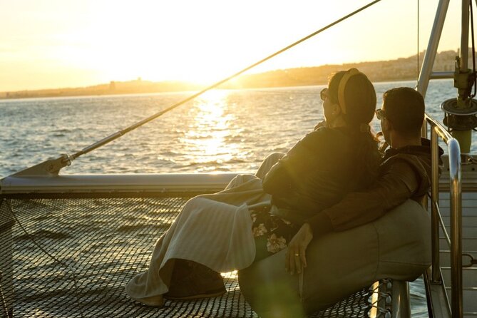 Lisbon : Sunset Catamaran Boat Tour with Music and Drinks - Who should book this catamaran—and who might want a different style