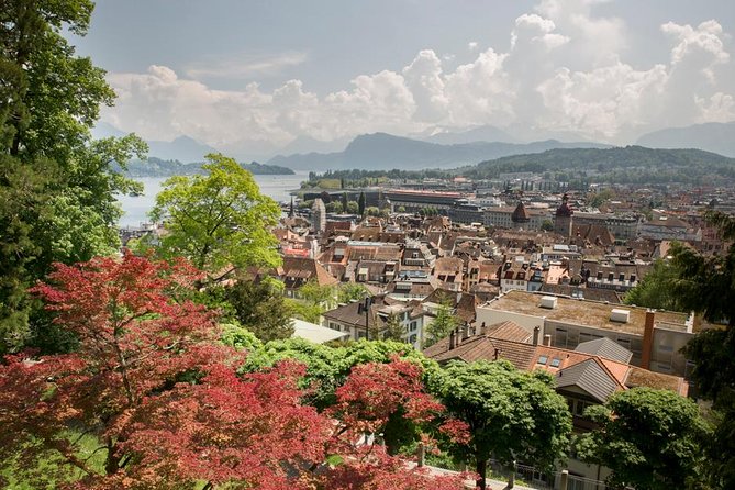 Lucerne Walking & Boat Tour: The Best Swiss Experience - Nine medieval towers, fortification walls, and Chaff Bridge