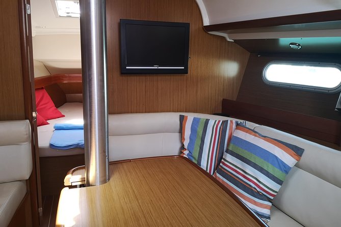 Madeira Private Sunset Boat Tour from Funchal - Onboard comfort: sparkling wine, snacks, music, and a restroom