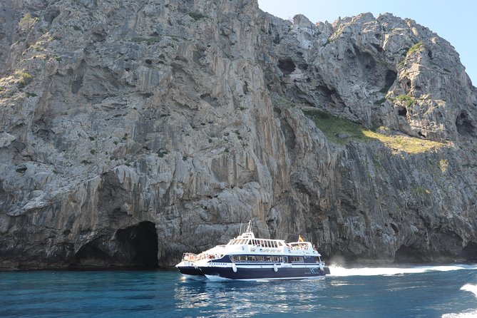 Mallorca in One Day Sightseeing Tour with Boat Ride and Vintage Train - Boat ride to Port de Sóller: sea views, caves, and that cliff energy