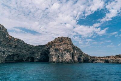 Malta: Comino Blue Lagoon Boat Tour, Sea Caves & Swim Stops - The scenic cruise to Comino: watch the coastline, not the clock