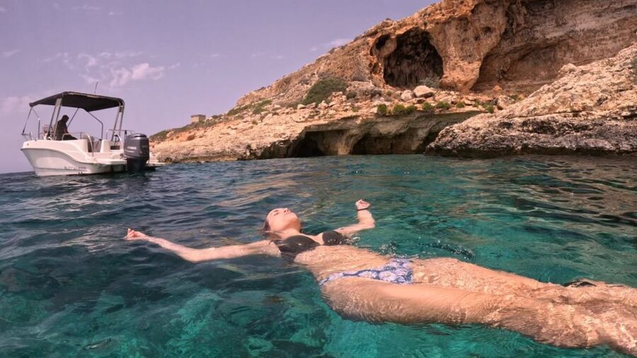 Malta: Crystal/Blue Lagoon, Comino & Gozo Private Boat Trip - Getting aboard: shade, Bluetooth, and a skipper who sets the tone