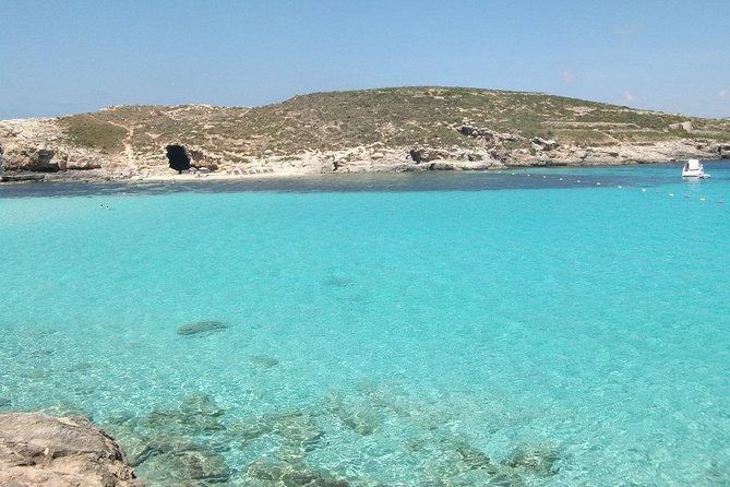 Malta Private Charter from Mellieha: Gozo, Comino, Blue Lagoon - Blue Lagoon from the boat: the swim stop you plan the whole trip around
