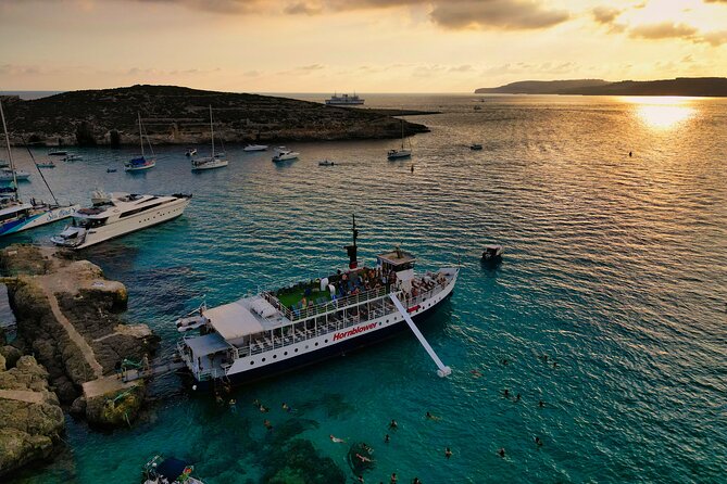 Malta Sunset Boat Tour: Bugibba to Comino Blue Lagoon Cruise - Bugibba Jetty to Comino: route views and real photo stops