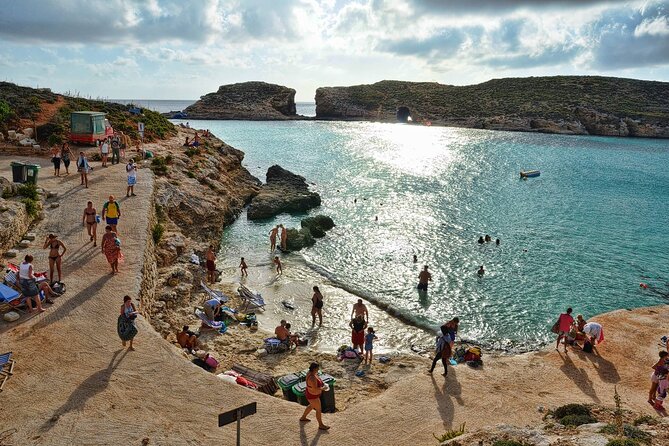 Malta Sunset Boat Tour: Bugibba to Comino Blue Lagoon Cruise - Sun deck strategy: where to sit, how to swim comfortably