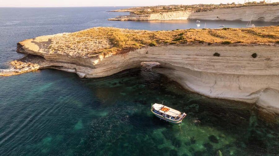 Malta: Sunset Boat Tour to St. Peter’s Pool and South Coast - What happens on board: guide talk, audio, and onboard basics